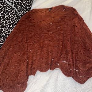 Burnt orange colored knit sweatshirt